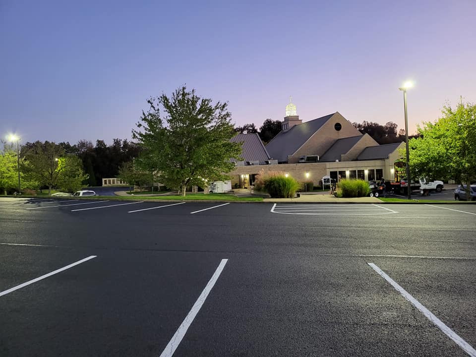 Parking lot with stripes at dusk